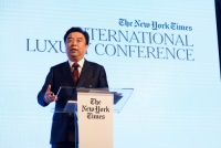 Chairman of Ruyi Fashion Holding Group, Qiu Yafu speaks at the New York Times International Luxury Conference
